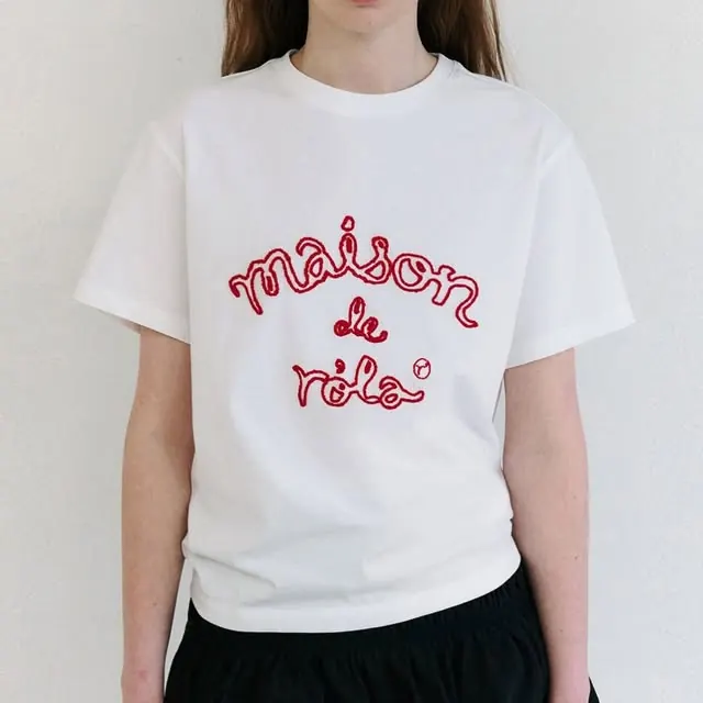 Graphic white T-shirt photographed by Saranghae Merch